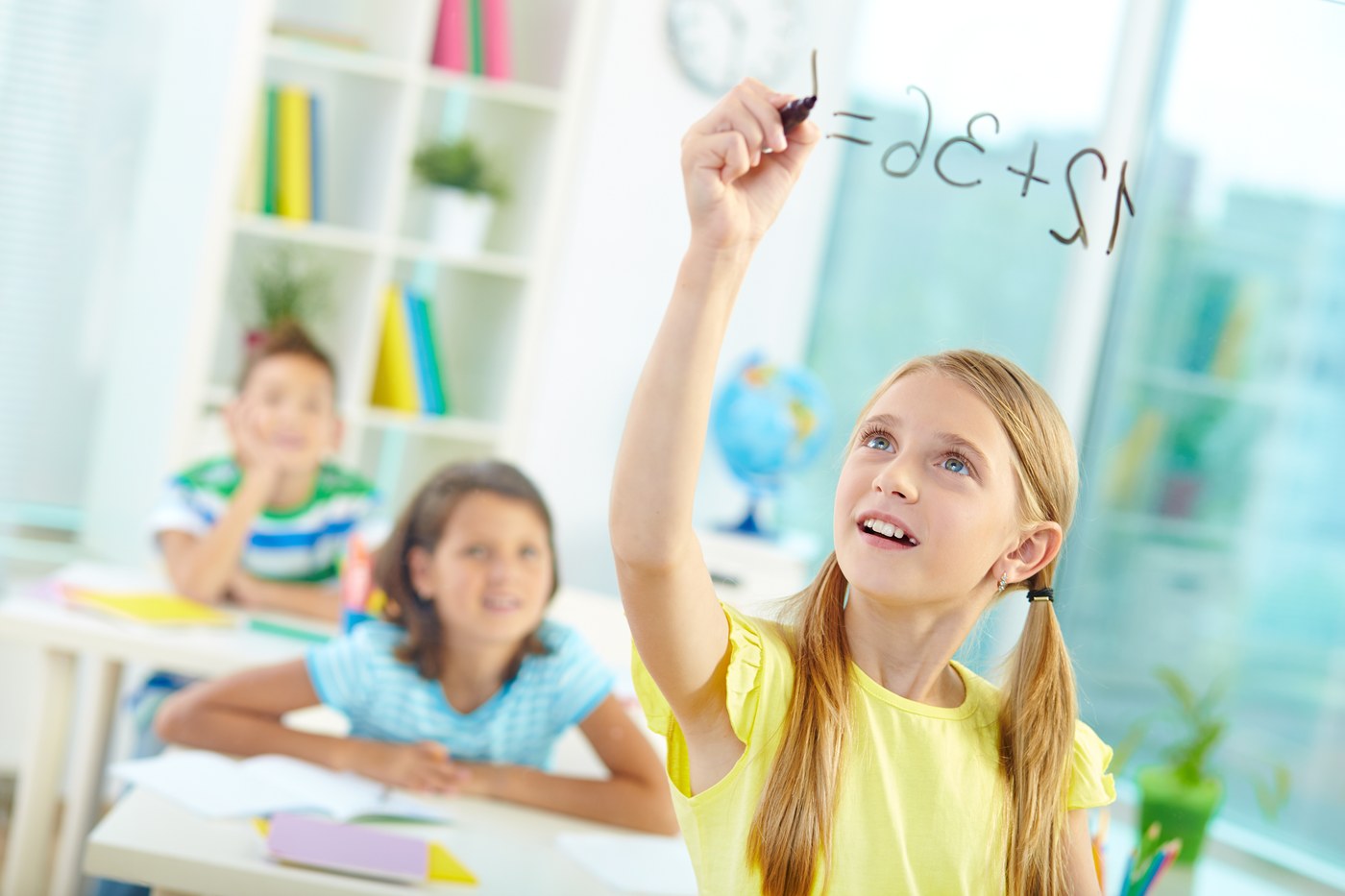 Elementary school classroom with students and teacher